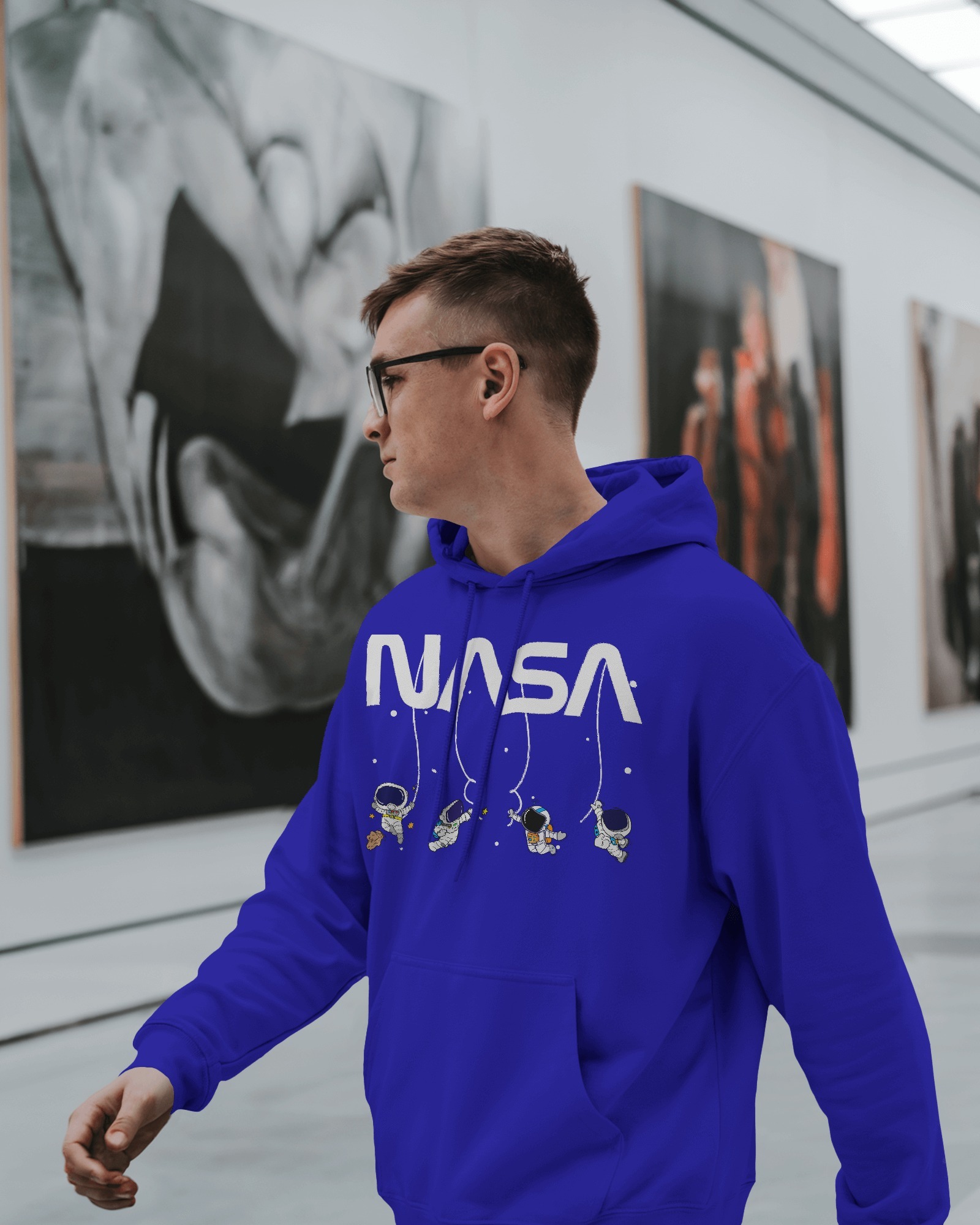 male blue NASA(white) hanging astronaut side1