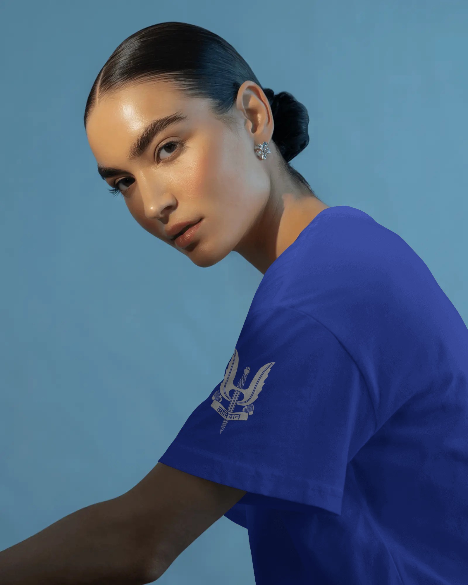 woman blue sidearm